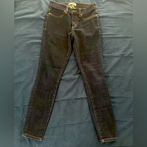 Dark wash, ankle length, skinny jeans.